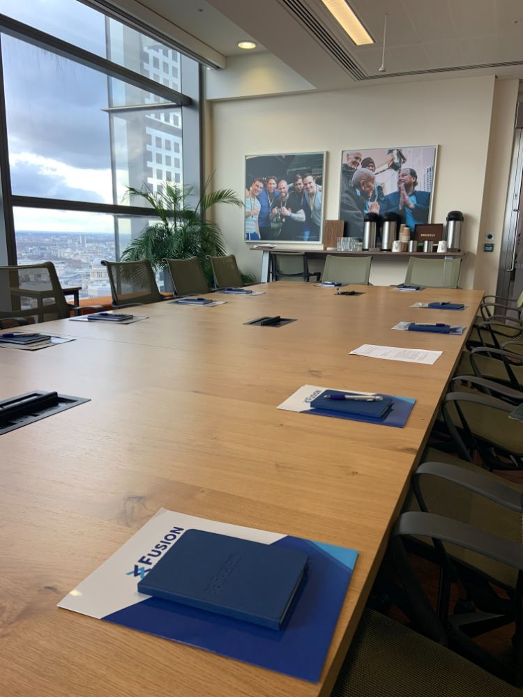 Boardroom set for a Fusion roundtable at Salesforce Tower London